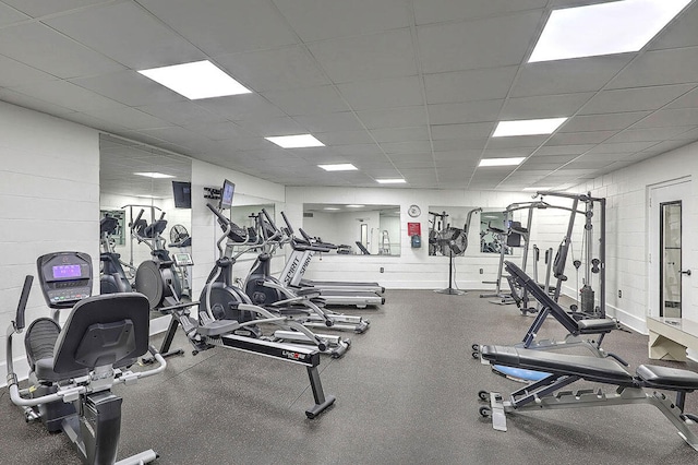 workout area with a drop ceiling