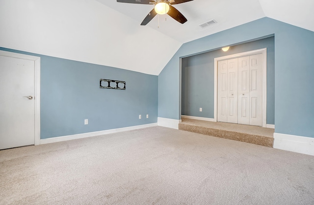 bonus room featuring visible vents, baseboards, a ceiling fan, carpet floors, and vaulted ceiling