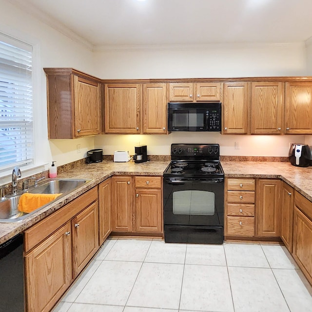 kitchen featuring black appliances, light tile patterned flooring, crown molding, and sink