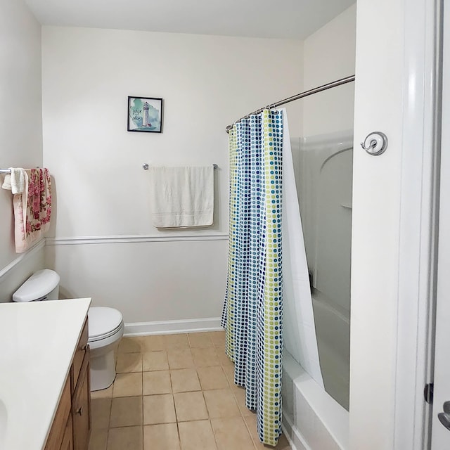 full bathroom featuring tile patterned floors, vanity, toilet, and shower / tub combo