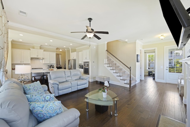 living room with ceiling fan, dark hardwood / wood-style floors, and crown molding