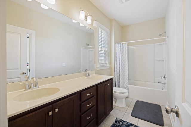 full bathroom with shower / bath combo, tile patterned floors, vanity, and toilet