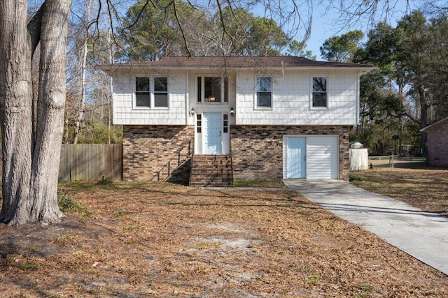 split foyer home featuring a garage