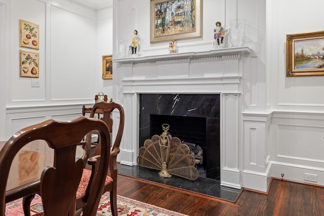 2 Bedons Aly, Charleston, SC 29401 - interior space with a premium fireplace, a decorative wall, and wood finished floors