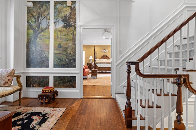 2 Bedons Aly, Charleston, SC 29401 - foyer entrance with a decorative wall, wood finished floors, and stairway