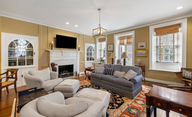 2 Bedons Aly, Charleston, SC 29401 - living area featuring a high end fireplace, ornamental molding, and wood finished floors
