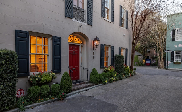 2 Bedons Aly, Charleston, SC 29401 - view of exterior entry featuring concrete block siding