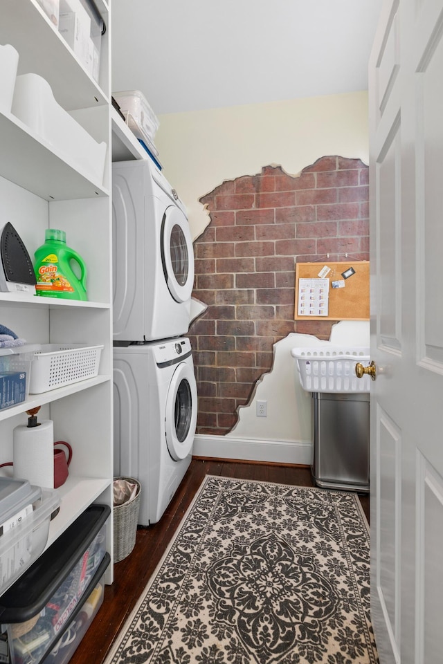 2 Bedons Aly, Charleston, SC 29401 - washroom featuring baseboards, stacked washer / dryer, laundry area, and dark wood-style floors