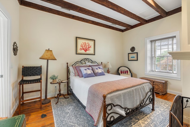 2 Bedons Aly, Charleston, SC 29401 - bedroom with visible vents, beam ceiling, baseboards, and hardwood / wood-style flooring