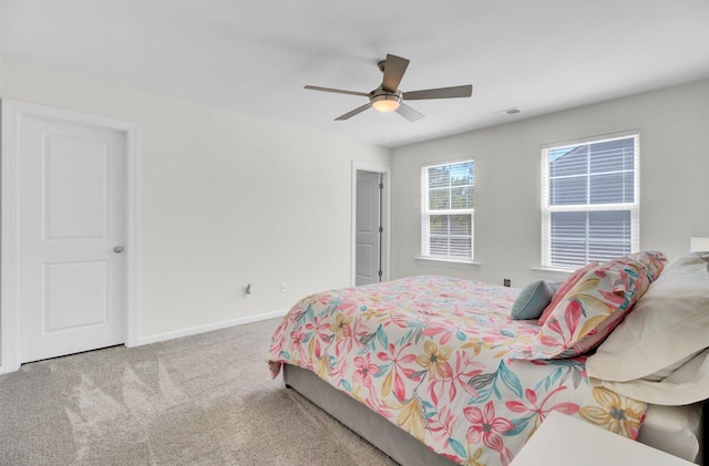 bedroom featuring carpet, baseboards, and ceiling fan