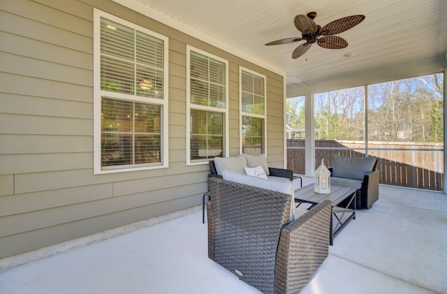 sunroom / solarium featuring wooden ceiling and a ceiling fan