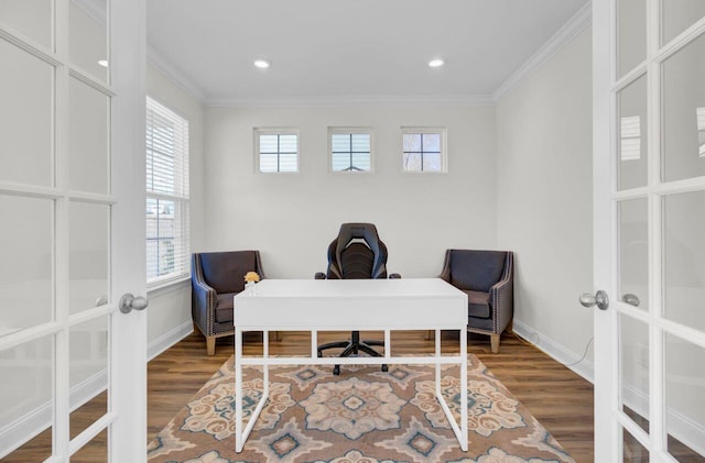 office featuring crown molding, wood finished floors, and french doors