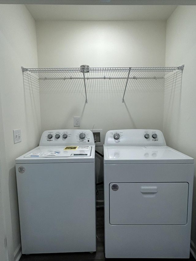 2502 Scarlett Maple St, Summerville, SC 29486 - laundry area with washer and clothes dryer and dark wood-style flooring