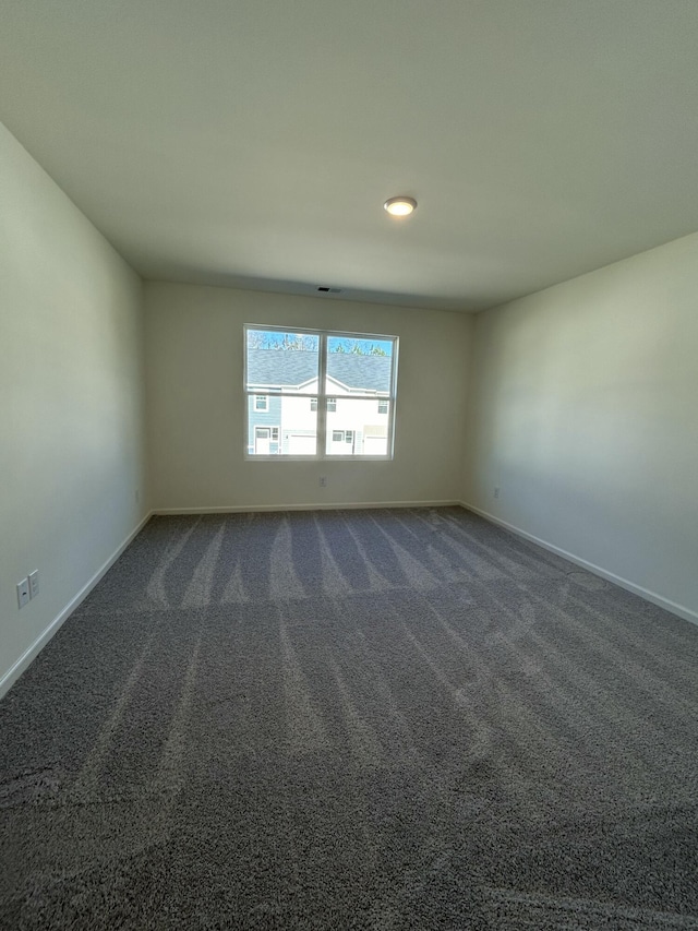 2502 Scarlett Maple St, Summerville, SC 29486 - unfurnished room with baseboards and dark colored carpet