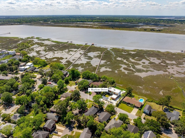 birds eye view of property with a residential view and a water view