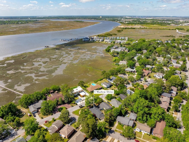 bird's eye view with a water view and a residential view