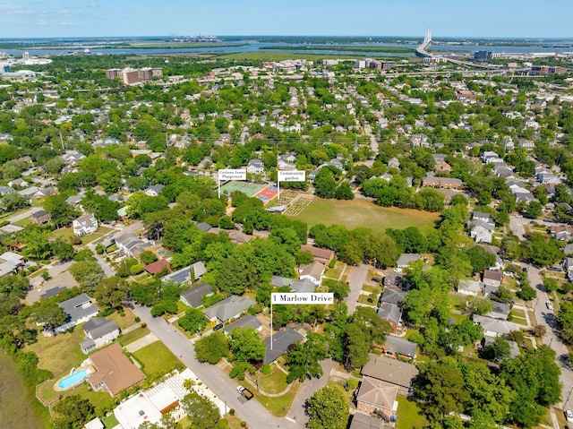 bird's eye view featuring a water view and a residential view