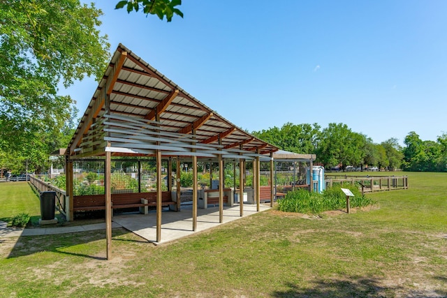 view of vehicle parking with a gazebo
