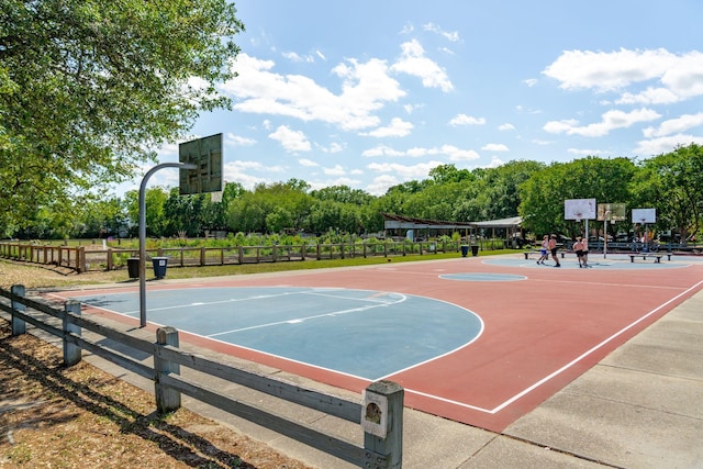 view of basketball court with fence and community basketball court