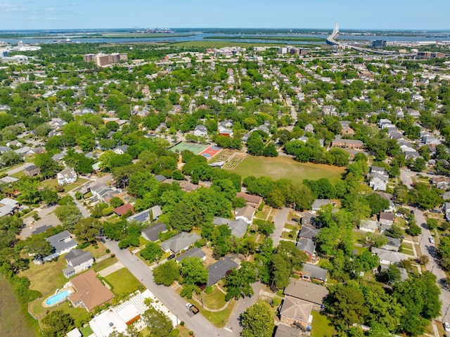 drone / aerial view featuring a water view and a residential view
