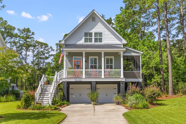 129 Martins Point Dr, Wando, SC 29492 - coastal home featuring stairs, a front lawn, driveway, and an attached garage