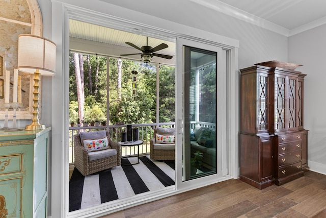 129 Martins Point Dr, Wando, SC 29492 - doorway to outside featuring wood finished floors, ceiling fan, and ornamental molding
