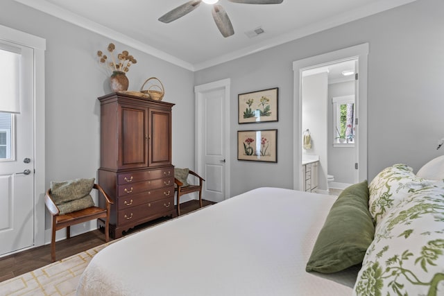 129 Martins Point Dr, Wando, SC 29492 - bedroom featuring crown molding, wood finished floors, ensuite bath, and a ceiling fan