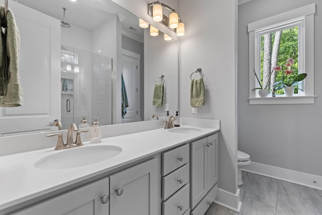 129 Martins Point Dr, Wando, SC 29492 - full bath featuring double vanity, a shower stall, and marble look tiles