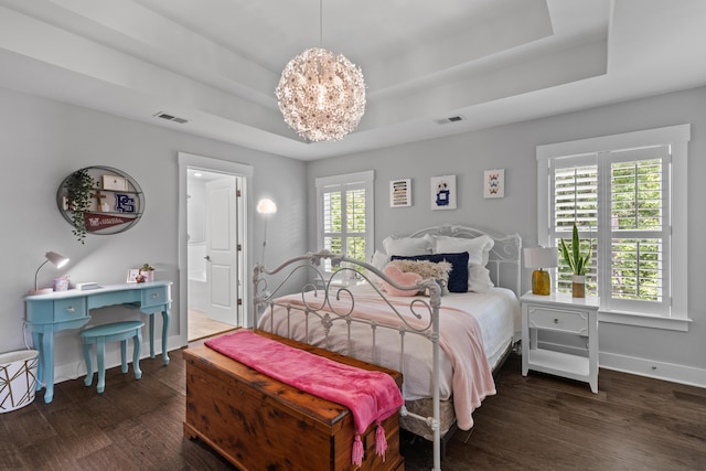 129 Martins Point Dr, Wando, SC 29492 - bedroom with a raised ceiling, wood finished floors, and a chandelier