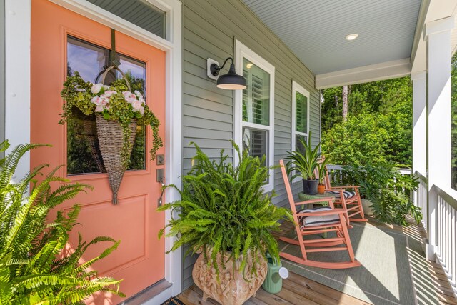 129 Martins Point Dr, Wando, SC 29492 - view of exterior entry featuring covered porch