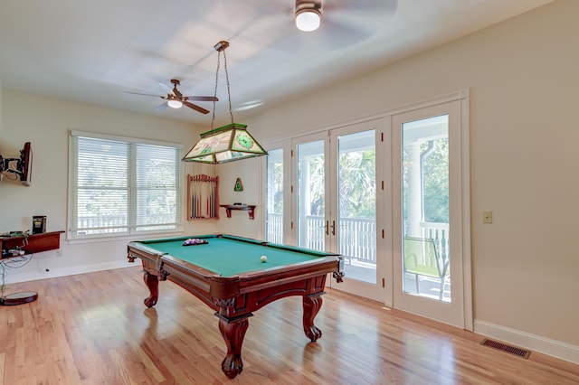 playroom with a ceiling fan, french doors, visible vents, and wood finished floors