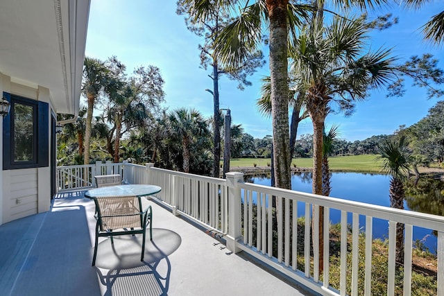 balcony featuring a water view