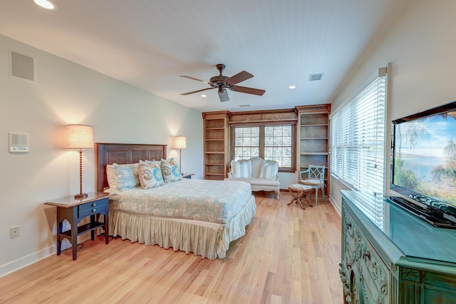 bedroom with light wood-type flooring, baseboards, visible vents, and recessed lighting