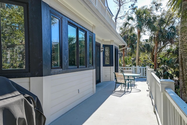 view of patio / terrace featuring outdoor dining space and a grill