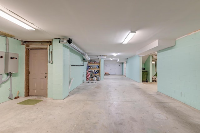 garage featuring concrete block wall