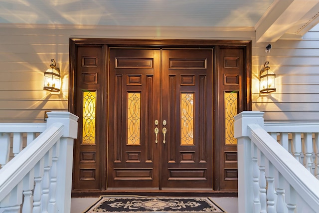 entrance to property with covered porch