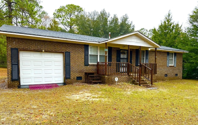 single story home with a front yard, a porch, and a garage