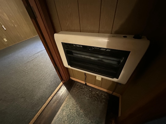 135 Golden Ave, Eutawville, SC 29048 - details with wood walls, carpet floors, and heating unit