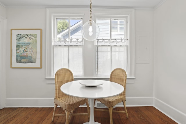 2060 Wappoo Hall Rd, Charleston, SC 29412 - dining space featuring dark wood-style floors, baseboards, and crown molding