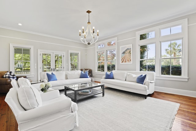 2060 Wappoo Hall Rd, Charleston, SC 29412 - living area featuring a chandelier, ornamental molding, baseboards, french doors, and wood finished floors