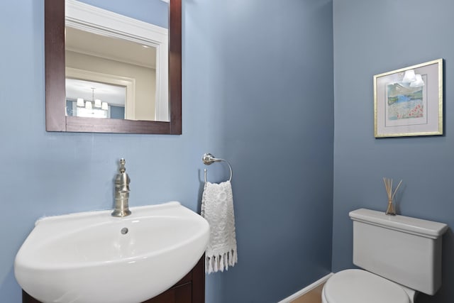 2060 Wappoo Hall Rd, Charleston, SC 29412 - half bath with toilet, baseboards, and vanity