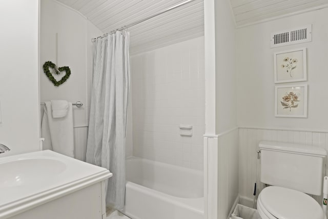 2060 Wappoo Hall Rd, Charleston, SC 29412 - bathroom featuring shower / tub combo with curtain, toilet, vanity, and wainscoting