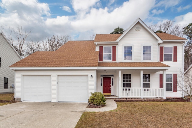 view of front of home with covered porch, a garage, driveway, roof with shingles, and a front yard