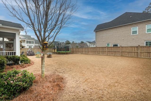 view of yard featuring a trampoline