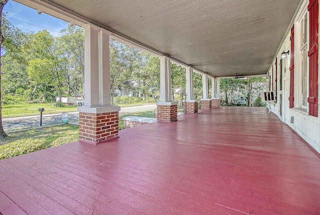 view of patio with cooling unit and covered porch