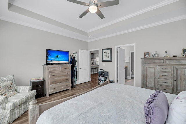 1173 Triple Crown Ct, Mount Pleasant, SC 29429 - bedroom featuring a ceiling fan, ornamental molding, a tray ceiling, and wood finished floors