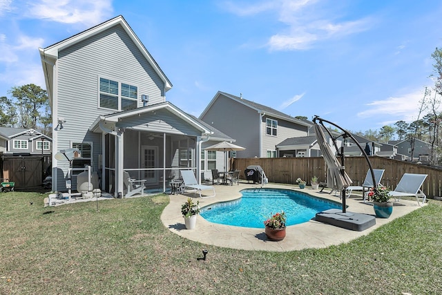 1173 Triple Crown Ct, Mount Pleasant, SC 29429 - view of swimming pool featuring a sunroom, a patio, a fenced backyard, a fenced in pool, and a yard