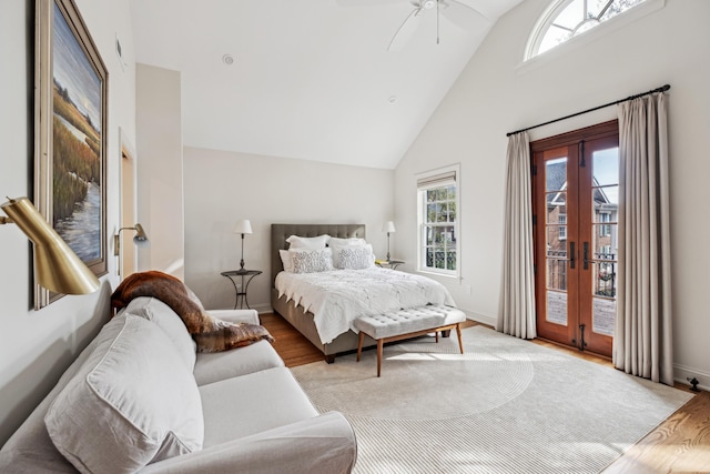 bedroom featuring french doors, ceiling fan, access to exterior, and light hardwood / wood-style floors