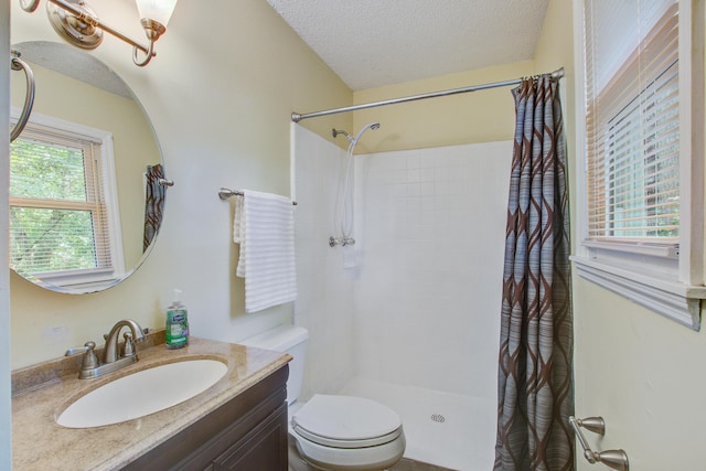 110 Terry Ave, Summerville, SC 29485 - full bathroom featuring toilet, tiled shower, vanity, and a textured ceiling
