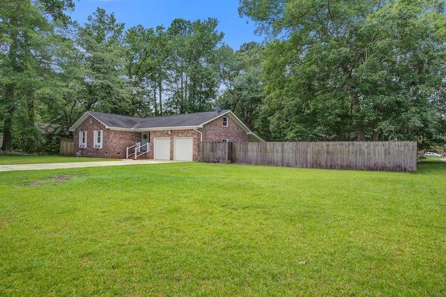 110 Terry Ave, Summerville, SC 29485 - view of front of home featuring an attached garage, driveway, and brick siding